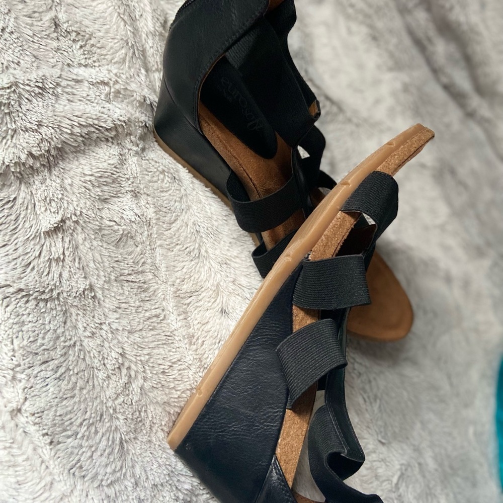 Black low wedge sandals